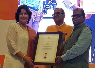 Commissioner and Director of Municipal Administration TK Sridevi receving SKOCH Award